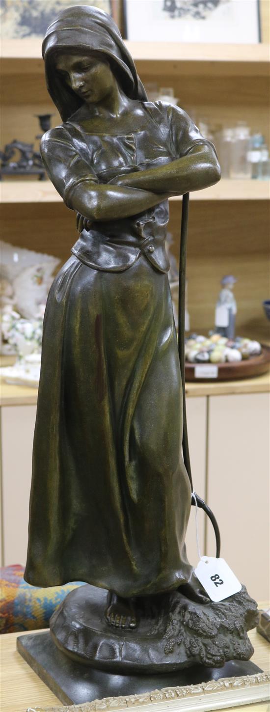 A.J. Scotte. A bronzed spelter model of a peasant girl, signed and dated 1906 height 71cm